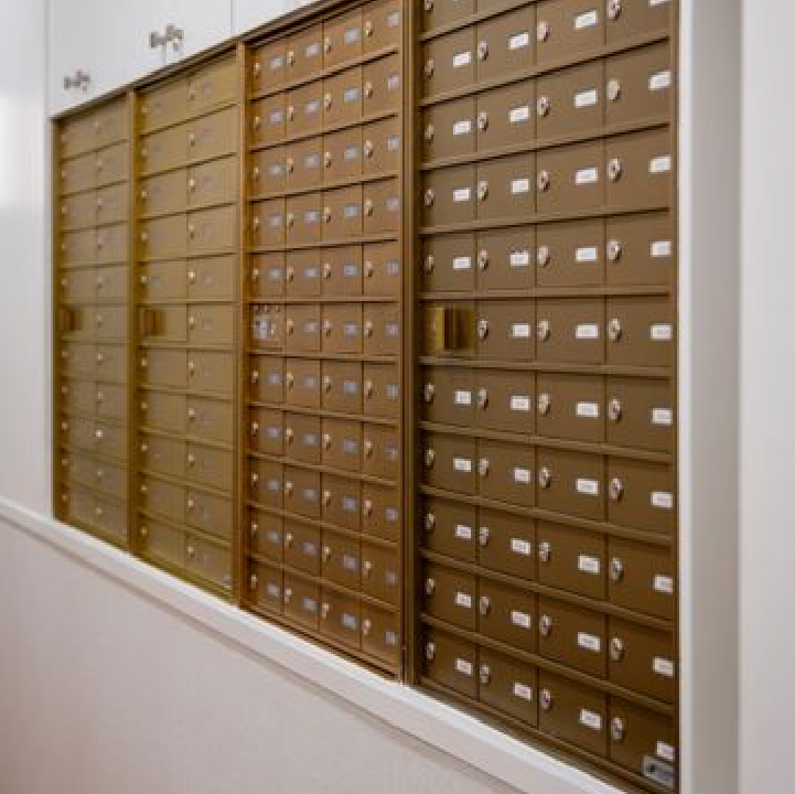 A wall with many different types of boxes.